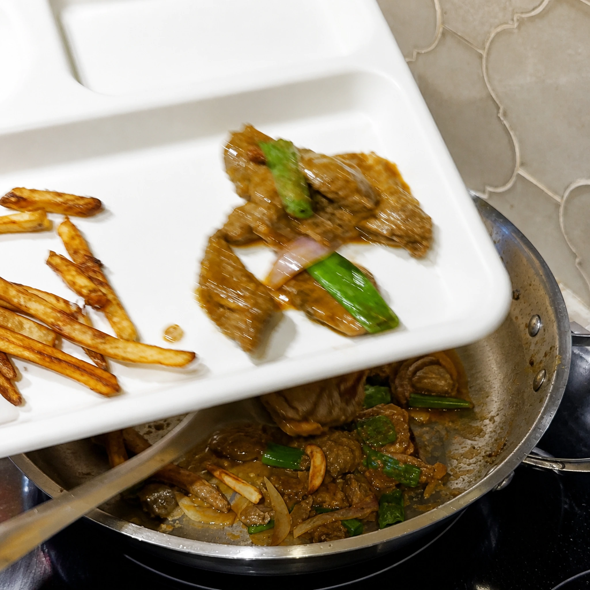 Step photo: fold in fries polished
